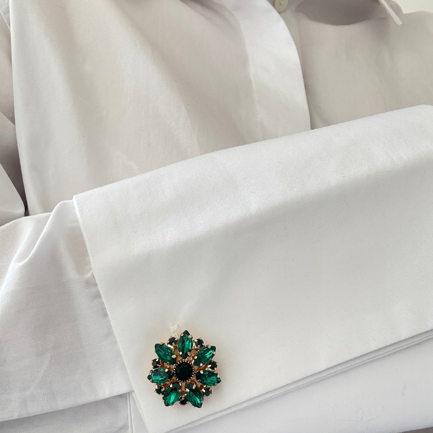 Plutee Noir worn on shirt button cuff