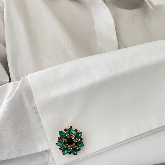 Plutee Noir worn on shirt button cuff